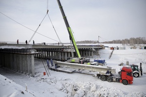 Завершен седьмой этап надвижки металлоконструкций строящегося моста через Томь в Кемерове.
